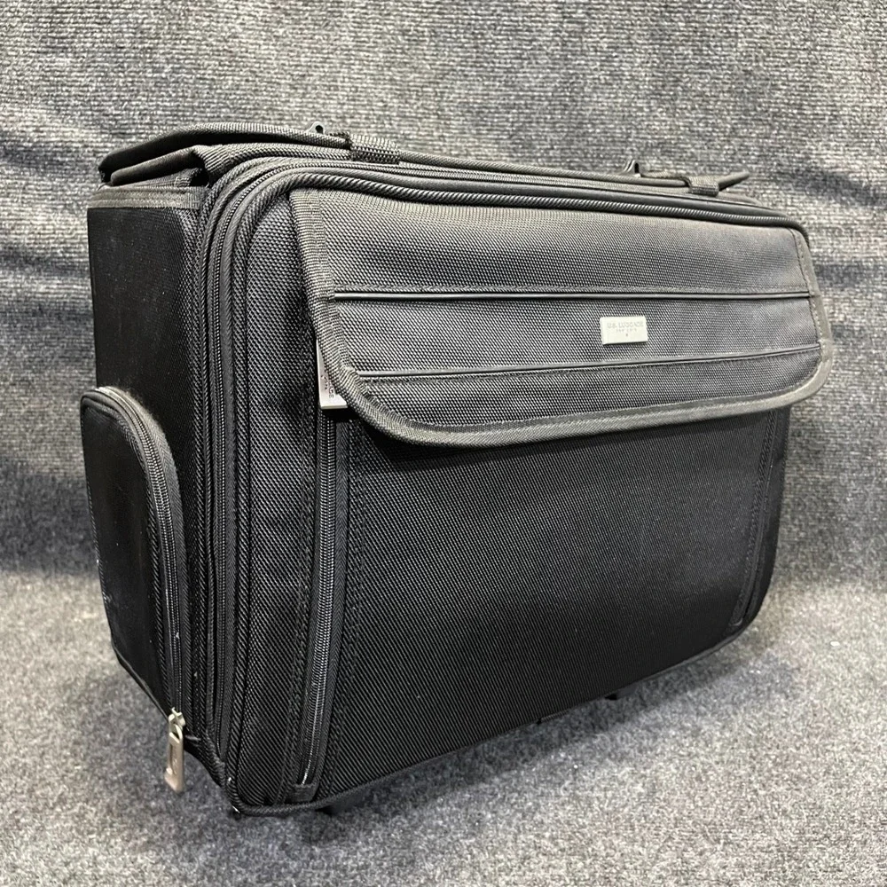 US Luggage New York Black Ballistic Nylon Rolling Catalog Case Wheeled Briefcase